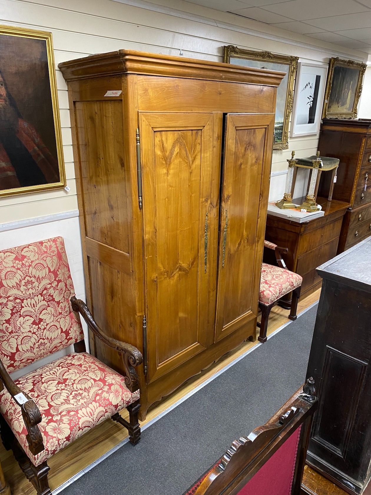 A 19th century French cherry armoire, width 142cm, depth 60cm, height 219cm